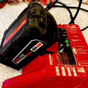 MILWAKUEE M18 RED LITHIUM XC 5.0 BATTERY PACK AND CHARGER